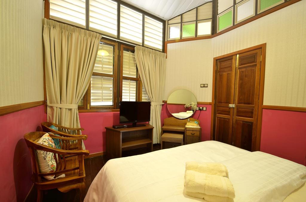 Yong Yi Yuen Guesthouse Джорджтаун Номер фото