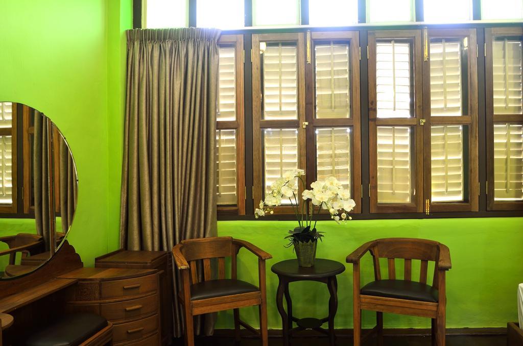 Yong Yi Yuen Guesthouse Джорджтаун Номер фото