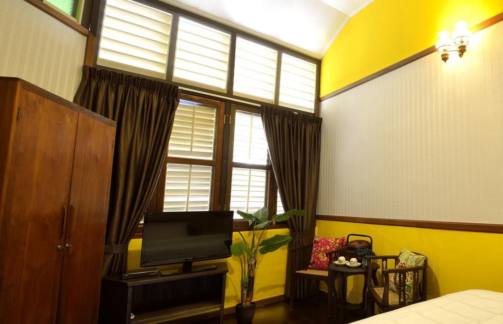 Yong Yi Yuen Guesthouse Джорджтаун Номер фото