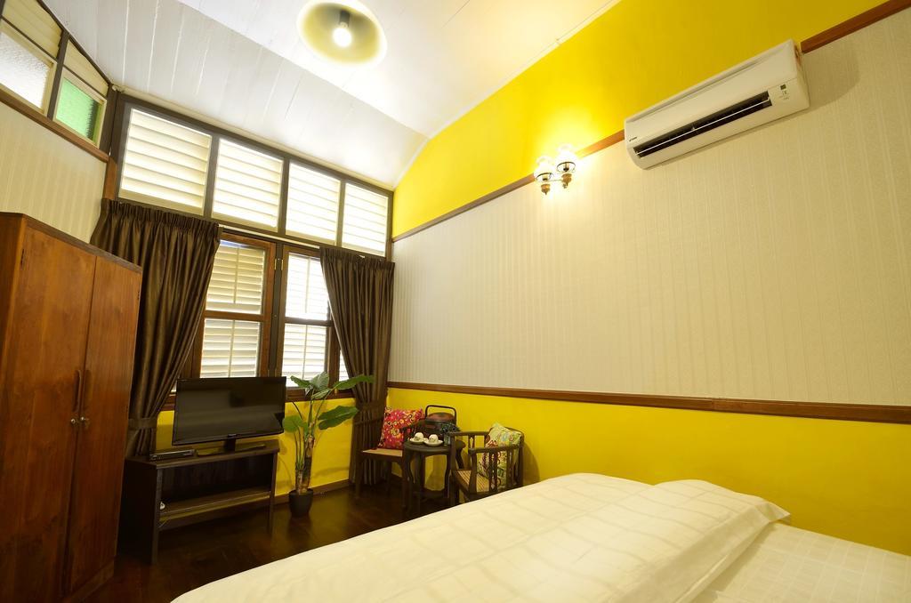 Yong Yi Yuen Guesthouse Джорджтаун Номер фото